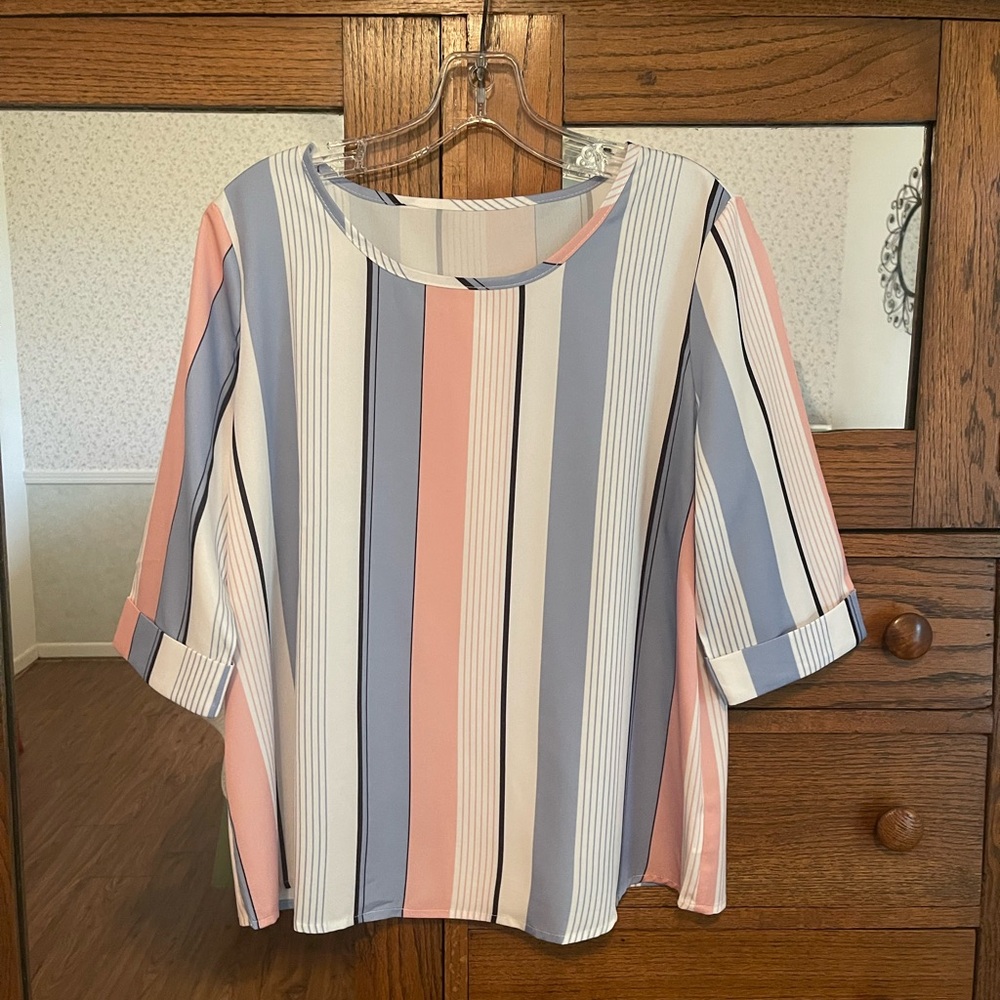 Woman’s Striped Top With Elbow Length Sleeves